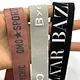 Highly resilient custom-sized elastic band with silicon printing, crafted from a blend of spandex and polyester, ideal for yoga and fitness apparel.